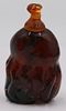 Carved Amber Buddha's Hand Snuff Bottle.