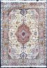 A Persian Tabriz silk & wool rug