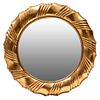 Espejo. SXX Diseño circular. Elaborado en madera y pasta dorada. Con luna circular. Decorado con elementos orgánicos. 82 cm diámetro