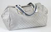 Gucci Silver Monogrammed Canvas Collapsible Carry-On Duffle Bag 40 Shoulder Bag, with blue, grey and white canvas straps, the top zip opening to a bla