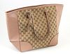 Gucci Antique Pink Grained Leather and Beige Monogrammed Canvas Bree Tote Shoulder Bag, the exterior with gold hardware and one Gucci charm and leathe