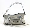Balenciaga Light Blue Distressed Leather Arena First Shoulder Bag, the exterior with aged brass hardware and a side zip compartment with a long leathe