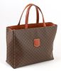 Celine Brown Macadam Coated Canvas Logo Handbag, the exterior with brown leather emblem and handles, opening to two brown lined open interiors with on