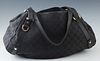 Gucci GG Black Canvas Shoulder Bag, with gold tone hardware and black leather accents, the interior of the bag lined in black canvas with a zip closur