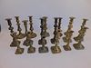17 ANTIQUE BRASS CANDLE HOLDERS