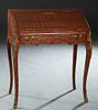 Louis XV Style Ormolu Mounted Parquetry Inlaid Mahogany Slant Front Secretary, 20th c., the slant lid with an inset gilt tooled leather writing surfac