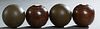 Group of Four English Wooden Bocce Balls, early 20th c., two of rosewood with two inset circular ivory plaques; and two with incised decoration, Dia.-