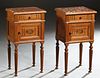 Pair of Louis Philippe Carved Walnut Marble Top Nightstands, 19th c., the inset highly figured brown marble over a frieze drawer and a pot cupboard, o