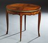 French Ormolu Mounted Inlaid Mahogany and Rosewood Coffee Table, 20th c., the circular top within a brass band, over a shaped scalloped skirt, on cabr