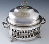 English Silverplated Warming Dish, 19th c., the domed lid over an interior dish above a hot water dish, and a lower alcohol burner, on a pierced sided