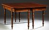 American Carved Mahogany D- End Dining Table, 19th c., the rounded edge top over a wide skirt, on turned and twist carved legs with toupie feet, with 
