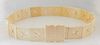 A Carved Ivory Belt, 20th c., designed as a series of square ivory panels, each with pierced motif to a cushion shape clasp with groove detail and sca