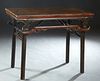 Unusual Chinese Carved Elm Folding Altar Table, early 20th c., with gilt, black and red lacquer decoration, with a pierced skirt, on circular legs, H.