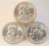 Three Rolls of Franklin Silver Half Dollars, two 1962 D, AU; 1963 D, AU.