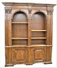 Walnut Bookcase, with fluted pilaster ends, with open shelves and door to either end, height 86 inches, total length 72 inches, total depth 18 1/2 inc