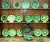 Twenty-One Piece Lot of Majolica, cabbage leaf and green plates and tableware, charger diameter 16 1/2 inches.