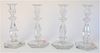 Set of Four Crystal Candlesticks, height 9 inches.