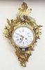 Louis XV Style French Wall Clock, brass with porcelain dial, small hairline in dial, height 19 inches.