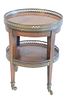 Continental Two Shelf Side Table, with brass gallery tops, on square tapered legs, ending in brass casters, height 15 inches, diameter 12 inches, (one
