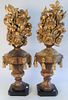 Pair of Carved Wood Cornucopia Urns, with gilt decoration (partially made using older elements), heights 29 inches.