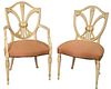 Set of Eight Shield Back Dining Chairs, with Blume design in white and gold trim, height 39 1/2".