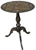 Black Lacquered Stand, having round, porcelain top, with painted game board, height 23 1/4 inches, diameter 19 1/4 inches.
