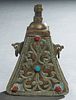 Unusual Arabic Triangular Powder Flask, early 20th c., mounted with cabochon turquoise and coral stones, with relief and incised decoration overall, H