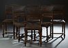 Set of Six Henri II Style Carved Walnut Dining Chairs, c. 1880, the embossed leather back over a pierced heart shaped panel, to trapezoidal embossed l
