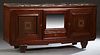 French Art Deco Carved Mahogany Marble Top Sideboard, c. 1930, the highly figured brown marble over a central beveled glazed door, flanked by two cupb