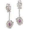 PAIR OF EARRINGS WITH RUBIES AND DIAMONDS IN PALLADIUM SILVER 2 Oval cut rubies ~1.40 ct, 150 8x8 cut diamonds ~3.0 ct