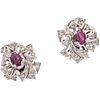 PAIR OF EARRINGS WITH RUBIES AND DIAMONDS IN PALLADIUM SILVER 2 Oval cut rubies ~0.60 ct, 28 8x8 cut diamonds ~0.28 ct