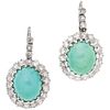 PAIR OF EARRINGS WITH TURQUOISES AND DIAMONDS IN 12K WHITE GOLD 2 Cabochon cut turquoise ~0.60 ct, 42 8x8 cut diamonds ~1.26 ct