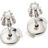 PAIR OF STUD EARRINGS WITH DIAMONDS IN 14K WHITE GOLD 2 8x8 cut diamonds ~0.08 ct. Weight: 1.0 g. Diameter: 0.15" (0.4 cm)