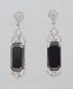 Pair of Platinum Pendant Earrings, with diamond mounted studs to rectangular 7.26 ct. black diamonds, the tops and bottoms of the black diamond with p