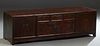 Chinese Republic Carved Elm Low Cabinet, early 20th c., with three small frieze drawers over double cupboard doors. flanked by double cupboard doors, 