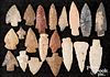 Collection of ancient flint points, mostly midwest
