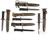 Five US WWII bayonets and scabbards