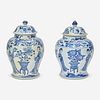 Two similar Chinese blue and white porcelain baluster jars and covers Kangxi period