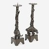 A pair of Japanese "Elephant and Dragon" patinated bronze openwork pricket candlesticks Edo period, 18th/early 19th Century