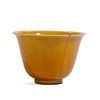 A YELLOW-GLAZED CUP