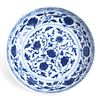 A CHINESE BLUE AND WHITE ‘FLORAL’ DISH