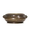 A CHINESE BRONZE CENSER WITH BEAST HANDLES