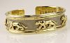Retro Cartier style 14 Karat Yellow and White Gold Panther Motif Cuff Bangle Bracelet.
