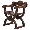 Curul. Francia. Siglo XX. Elaborado en madera de roble. Con respaldo semiabierto, asiento en vinipiel color marrón.