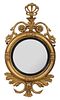 Classical Carved, Gilt, and Ebonized Convex Mirror