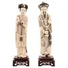 IMPERIAL COUPLE CHINA, 20TH CENTURY Ivory carving with sgraffito and inked motifs; openwork wooden bases 11.8" (30 cm) tall
