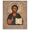 ICON RUSSIA, 19TH CENTURY CHRIST PANTOCRATOR Oil on wood, with gold and silver metallic foil jacket 12.4 x 10.8" (31.5 x 27.5 cm)