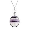 A Blue John pendant Of oval section with lilac and dark amethyst parallel veining, 29mm x 37mm, in w