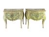 A Pair of Italian Rococo Style Painted Commodes
Height 34 1/2 x length 36 x depth 19 inches.