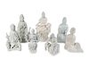 Seven Chinese Blanc de Chine Porcelain Figures of Seated Guanyin and Maidens
Heights 7 to 11 ¾ inches.